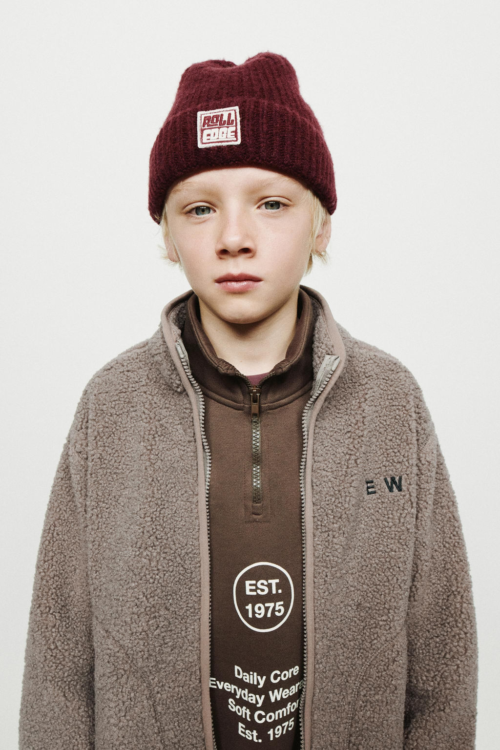 FAUX SHEARLING JACKET WITH EMBROIDERED TEXT