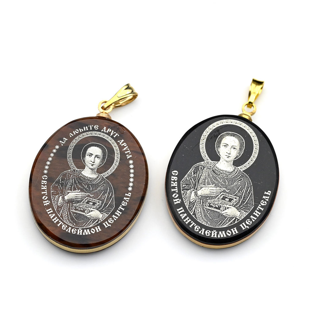 Кулон из обсидиана овал с окантовкой " Пантелеймон" 20*30мм.