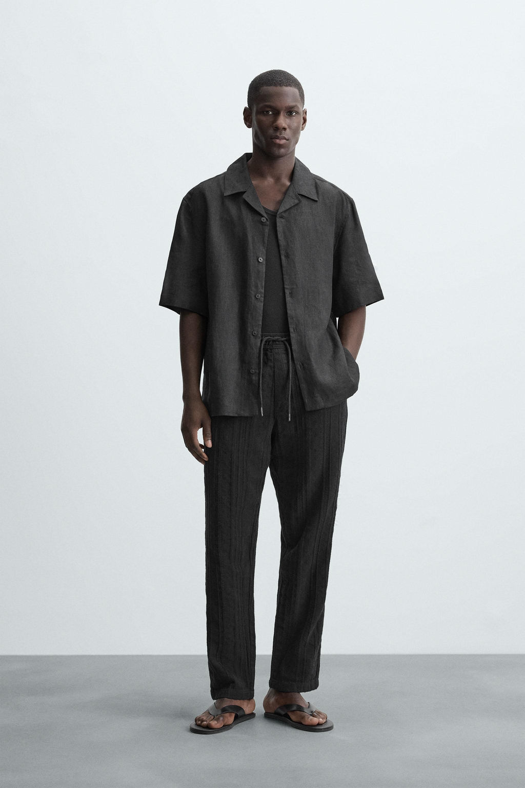 RELAXED FIT TEXTURED TROUSERS