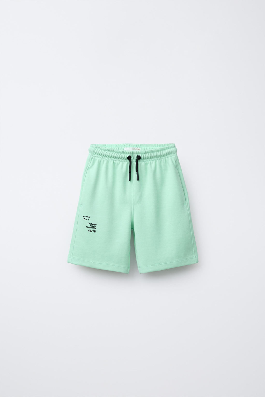 SPORTY BERMUDA SHORTS WITH RAISED SLOGAN