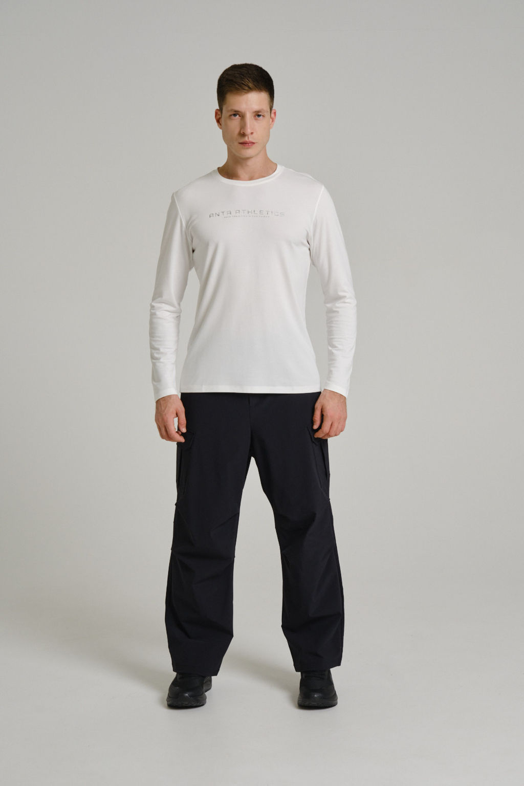 Брюки текстильные Черный COMMUTE Woven Track Pants - Anta фото 6