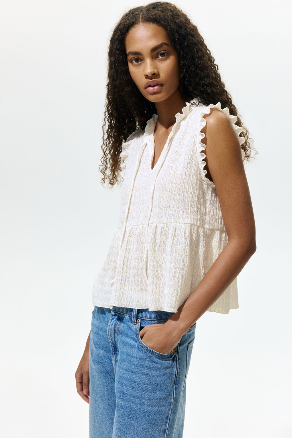 Top con ribetes de volante y lazada - H&m фото 7