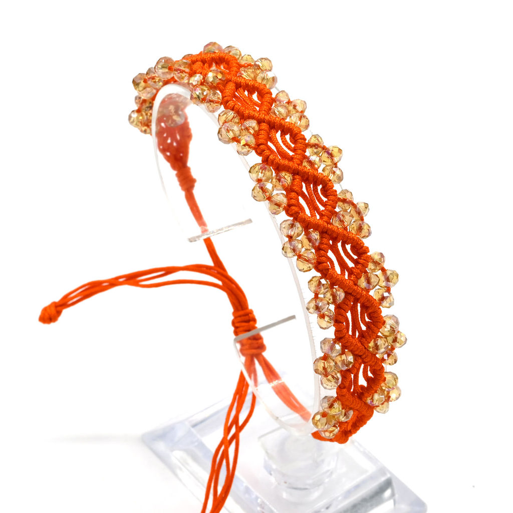 Браслет плетеный с цирконами оранжевый