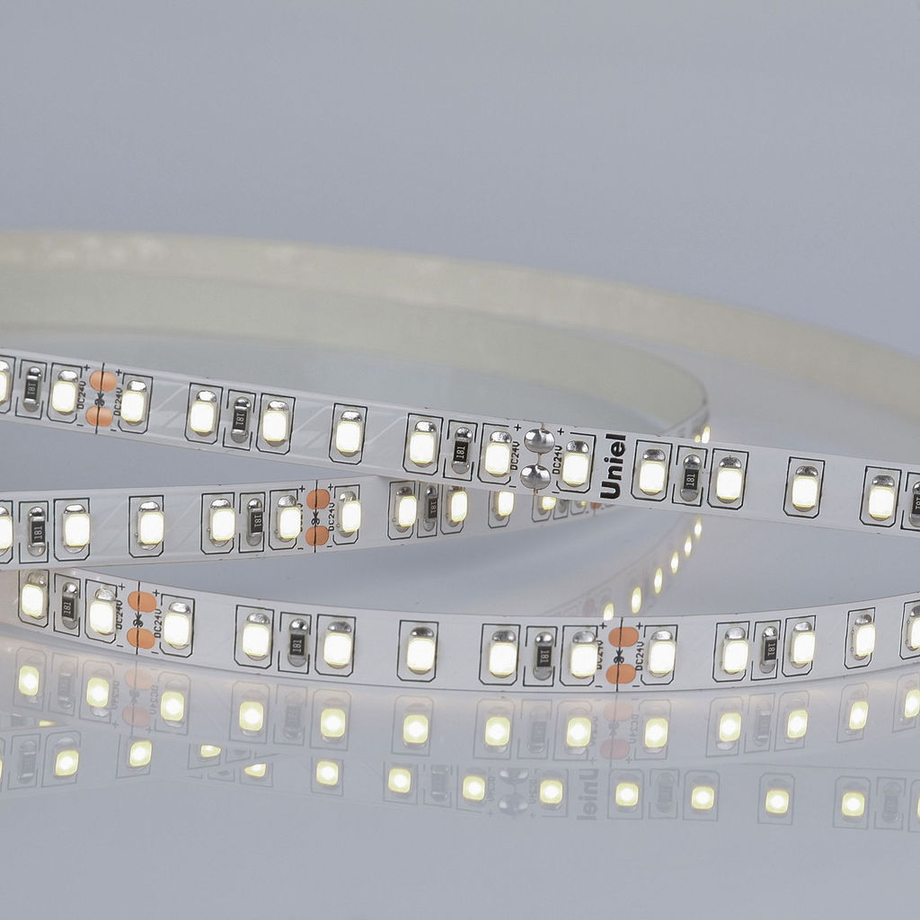ULS-2835-120LED/m-8mm-IP20-DC24V-9,6W/m-5M-4000K Гибкая светодиодная лента на самоклеящейся основе. Катушка 5 м. в герметичной упаковке. Белый свет (4000K). ТМ Uniel.