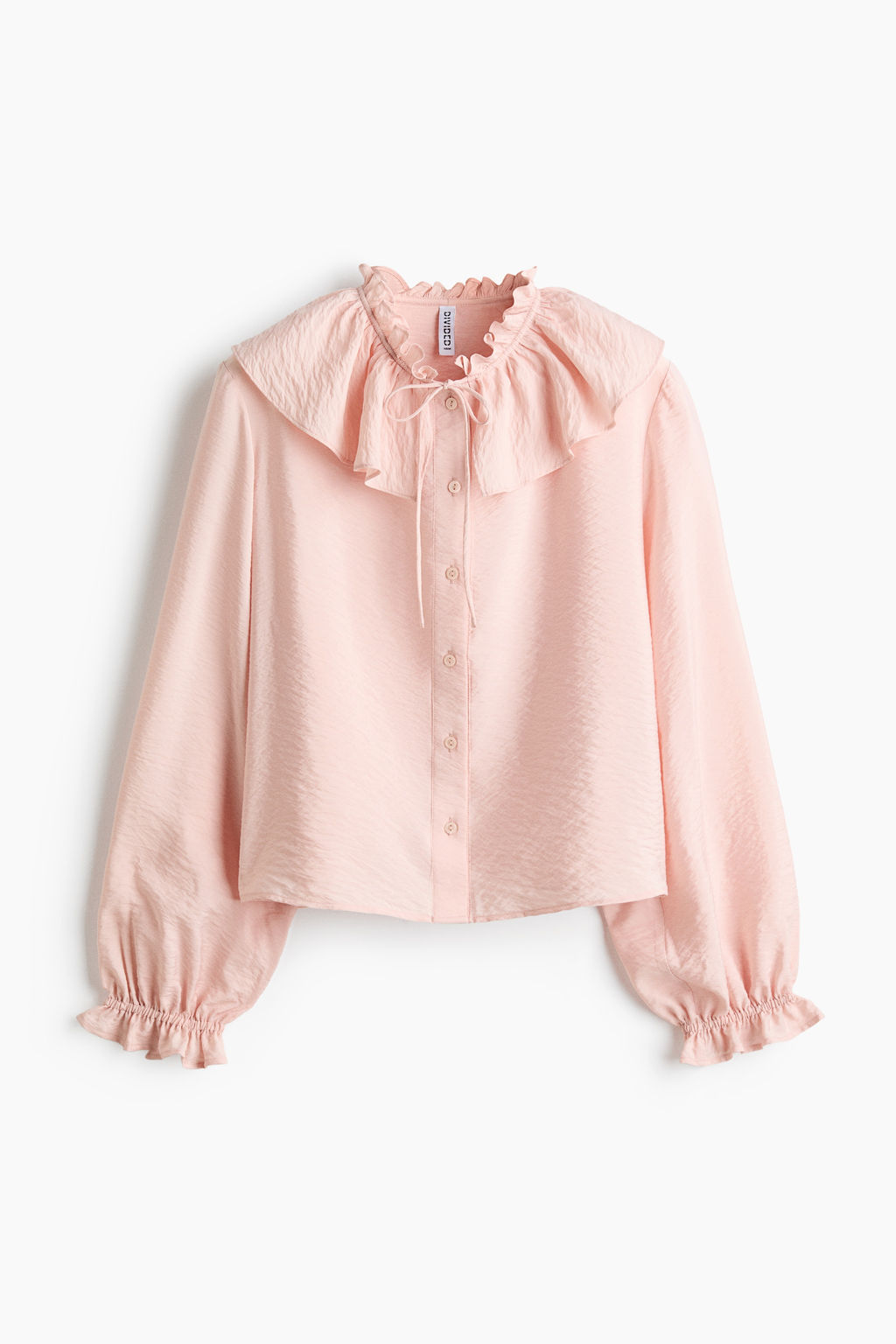 Blusa con ribetes de volante