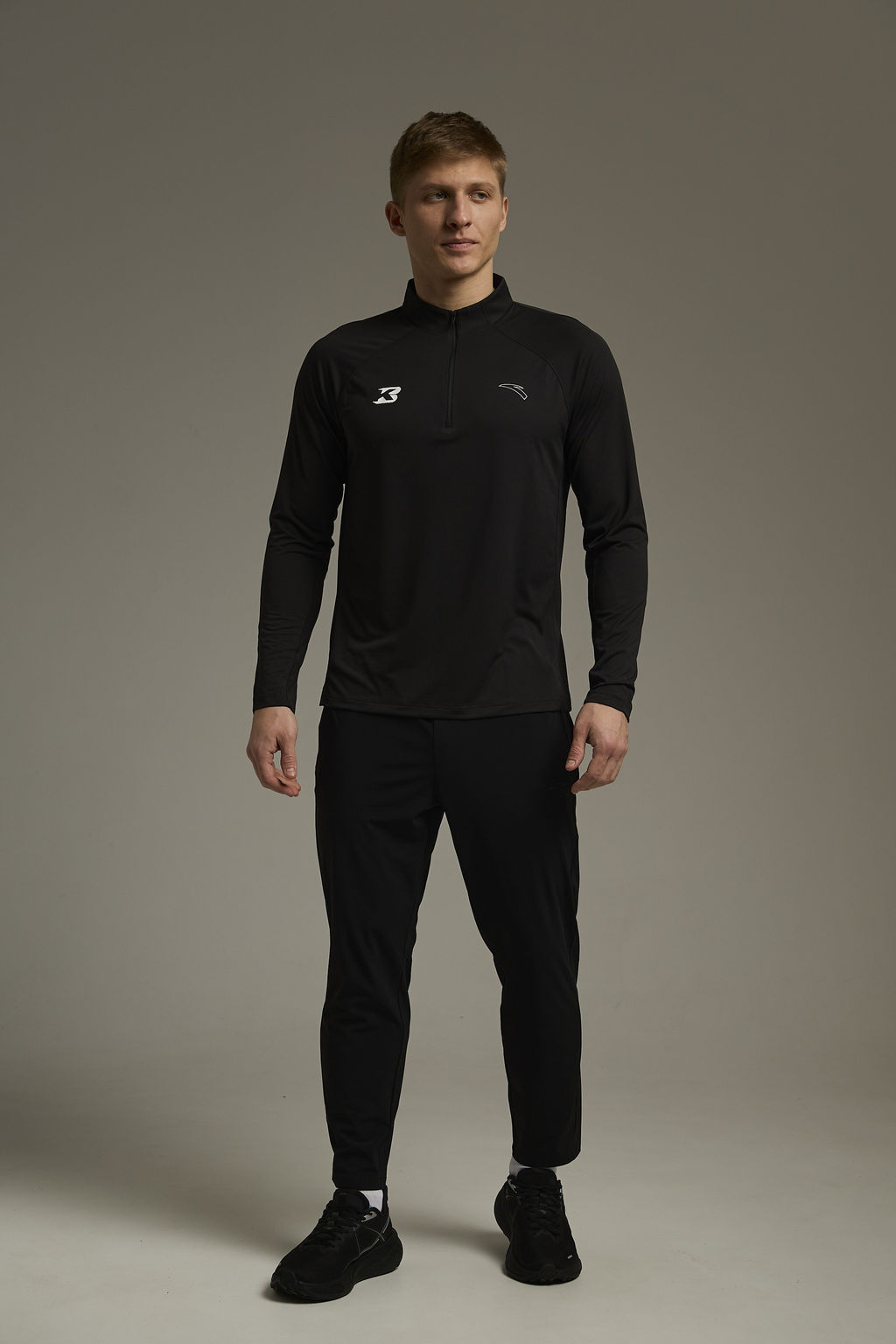 Брюки трикотажные укороченные Черный ADVANCED RUNNING Knit Ankle Pants