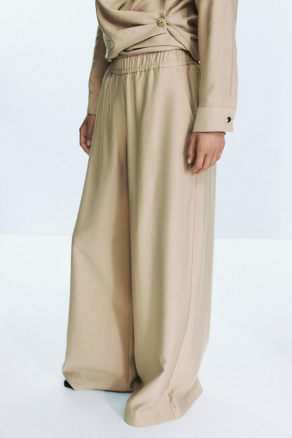 WIDE-LEG TROUSERS WITH ELASTIC WAIST