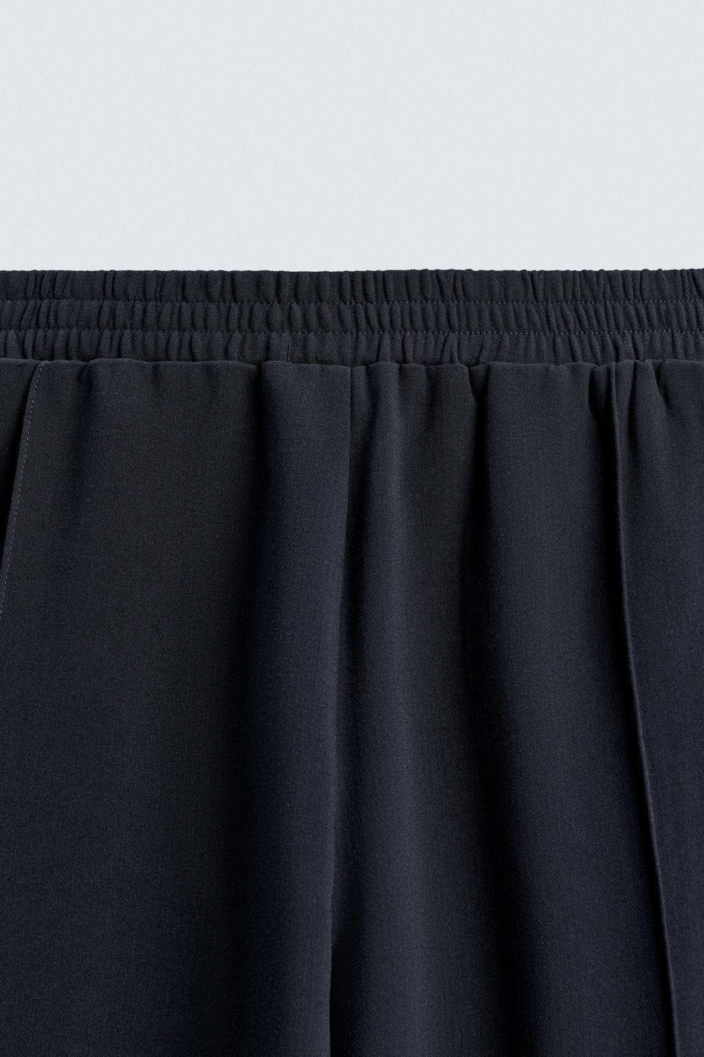 FLOWING TROUSERS WITH ZIPS