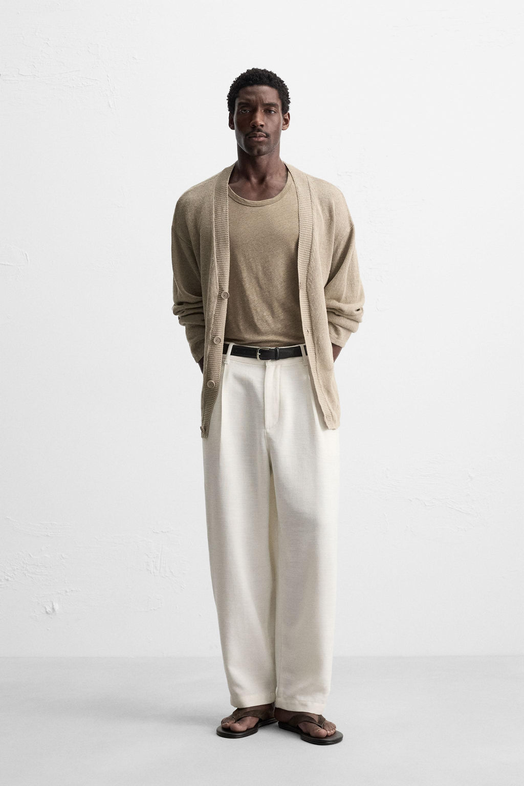 RELAXED FIT PLEATED TROUSERS