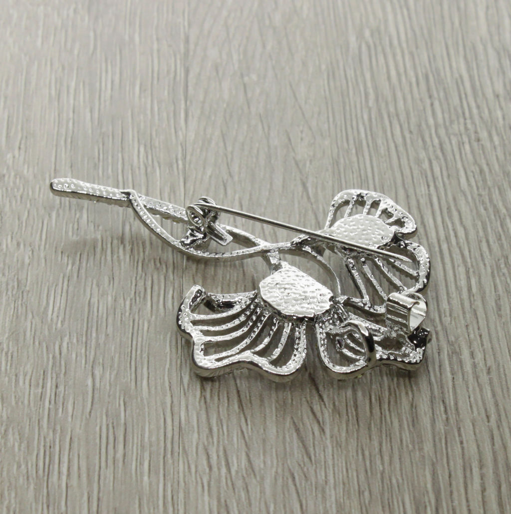 Брошь-подвеска "Мак" со вставками из гелиотиса и ювелирного сплава