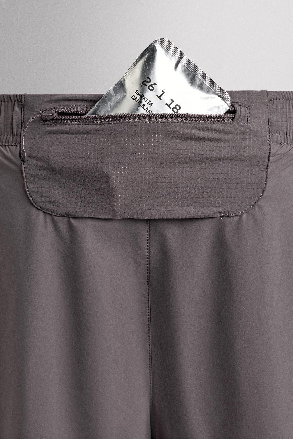 PANTALONES CORTOS RUNNING 2 EN 1 / Morado