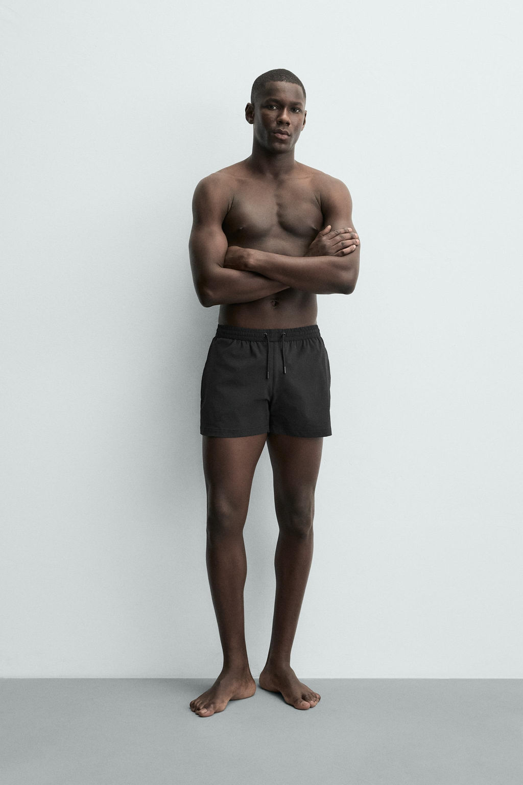 SHORT STRUCTURED SWIMMING TRUNKS