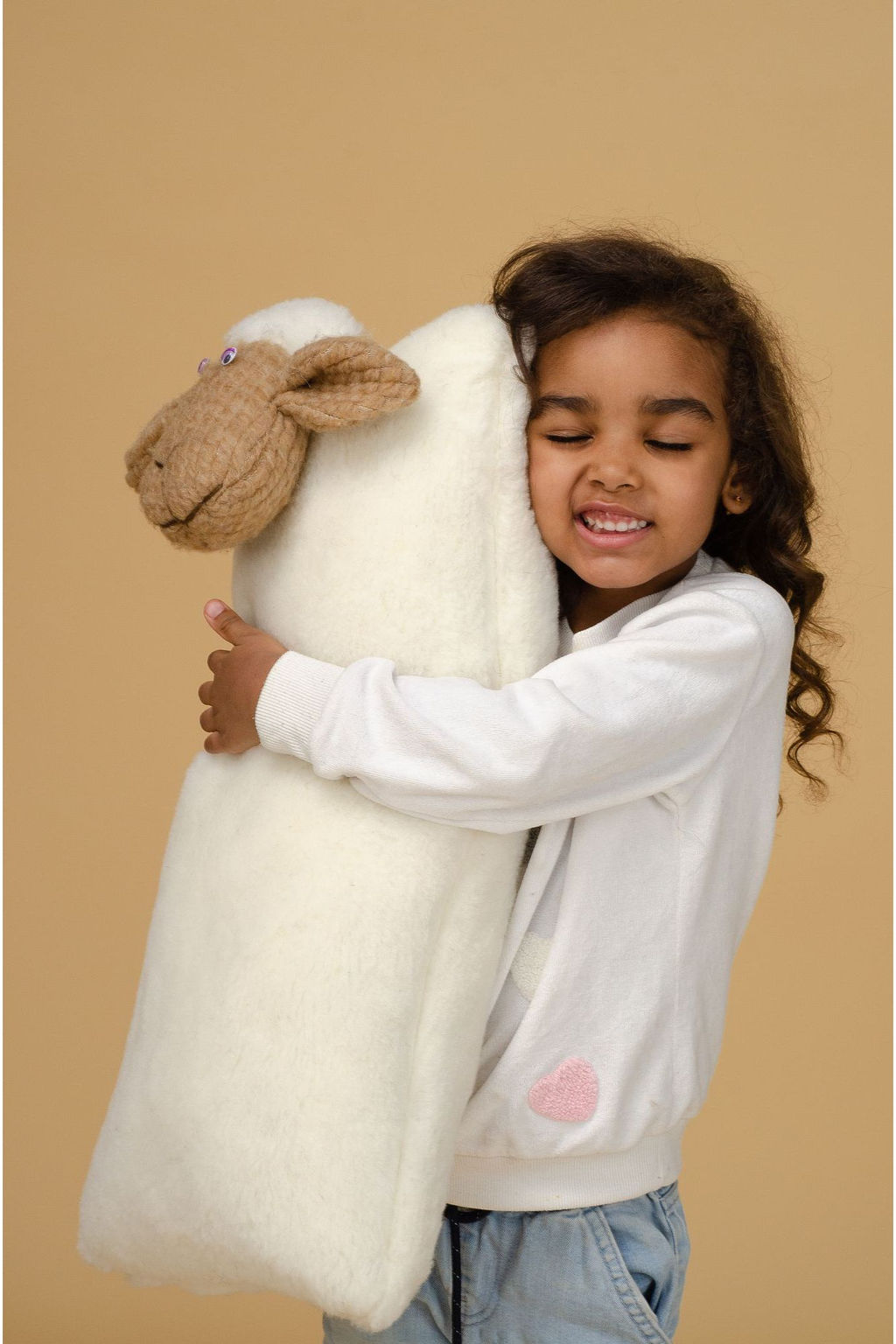 Подушка-игрушка Овечка 30х60 (цвет ВАНИЛЬ)