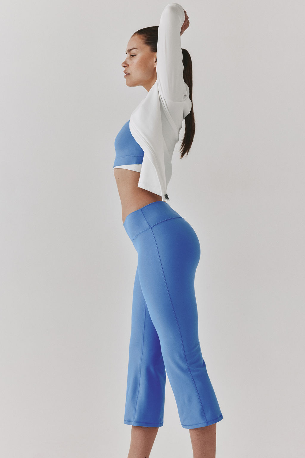Leggings capri de deporte con SoftMove Flared - H&m фото 3