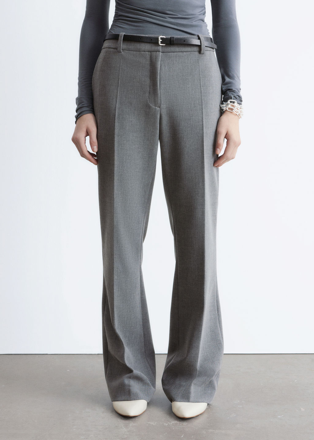 Pantalones acampanados con pliegues marcados - H&m фото 7