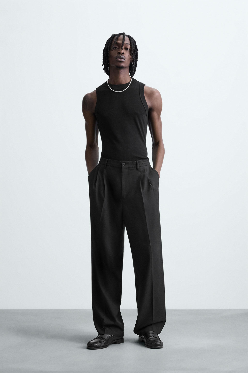FLOWING WIDE-LEG PLEATED TROUSERS