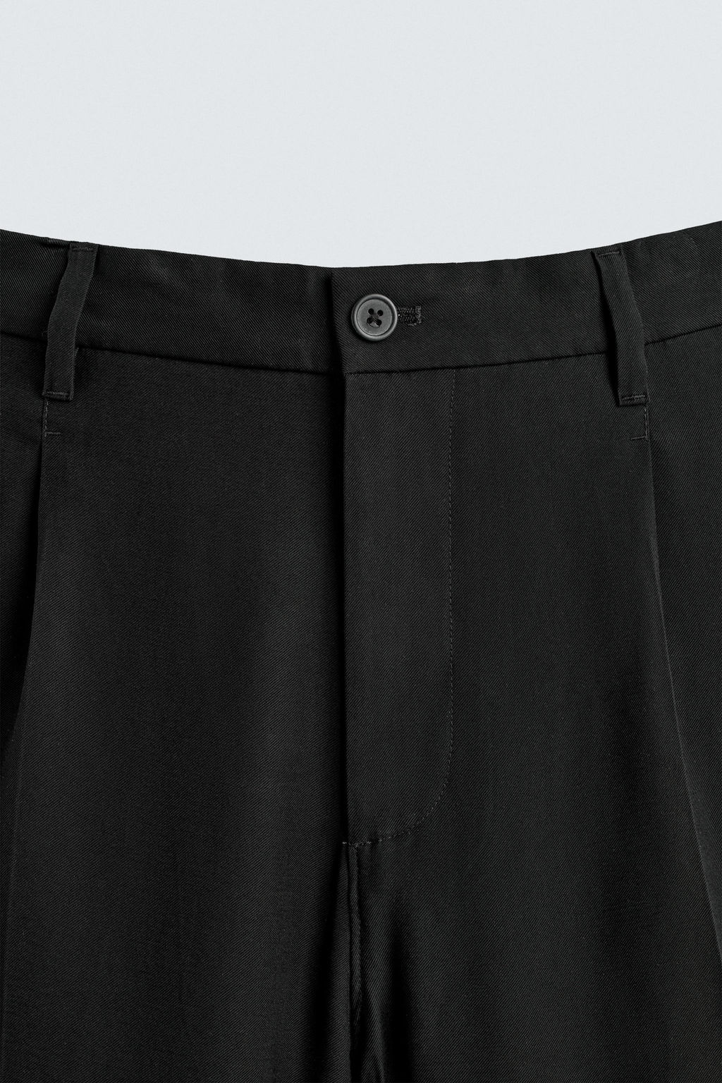 PANTAL?N FLUIDO RELAXED FIT PLIEGUES / Negro