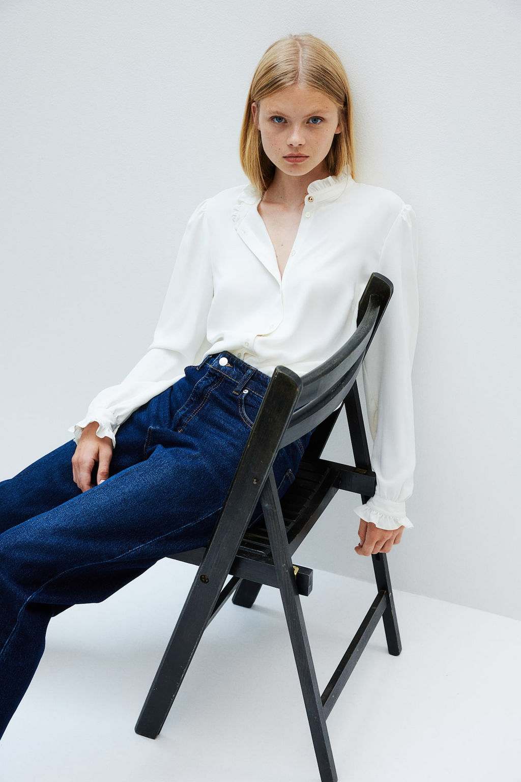 Blusa con ribetes de volante