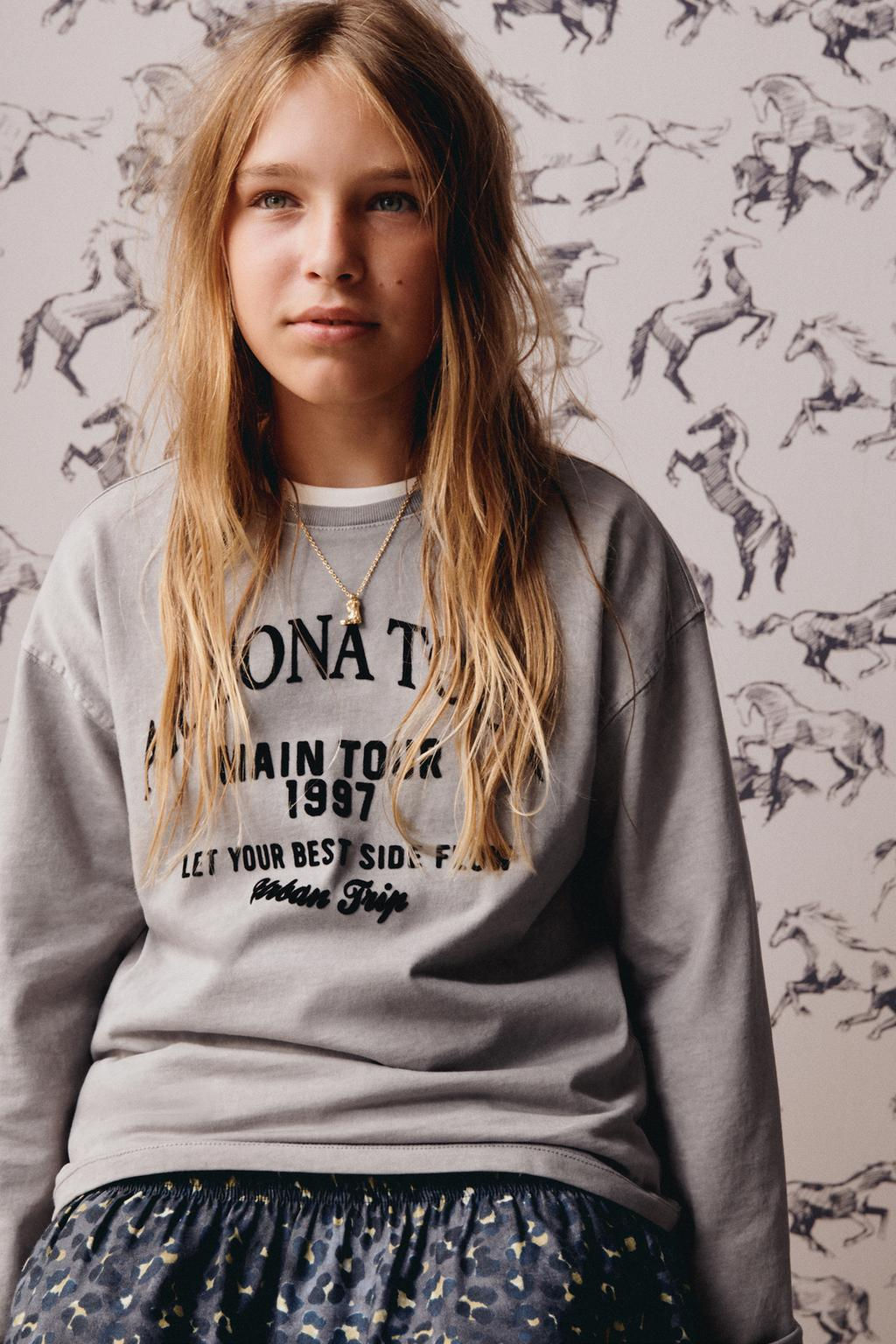 T-SHIRT WITH EMBOSSED TEXT
