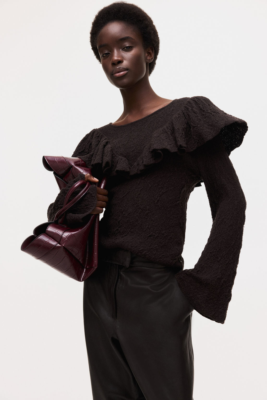 Top en punto texturizado con volantes - H&m фото 3