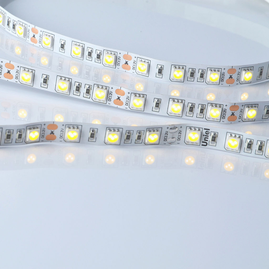 ULS-M25-5050-60LED/m-10mm-IP20-DC12V-14,4W/m-5M-3000K PROFI Гибкая светодиодная лента на самоклеящейся основе. Катушка 5м. в герметичной упаковке. Теплый белый свет(3000К). ТМ Uniel.