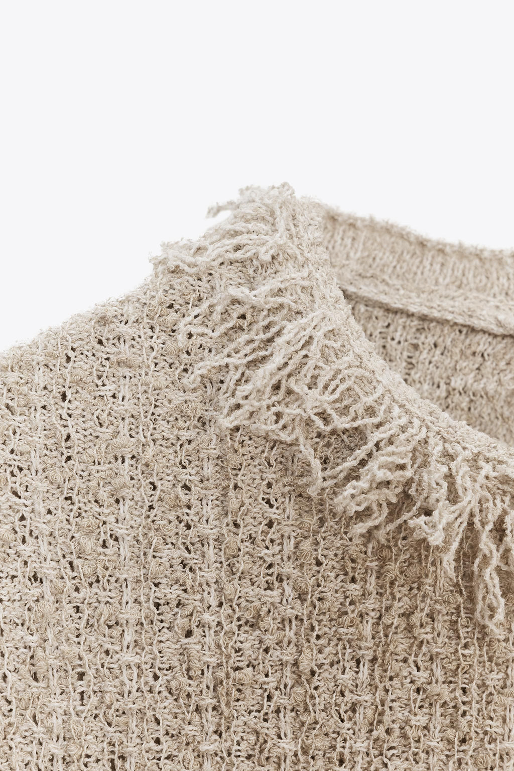 TEXTURED KNIT FRINGED TOP