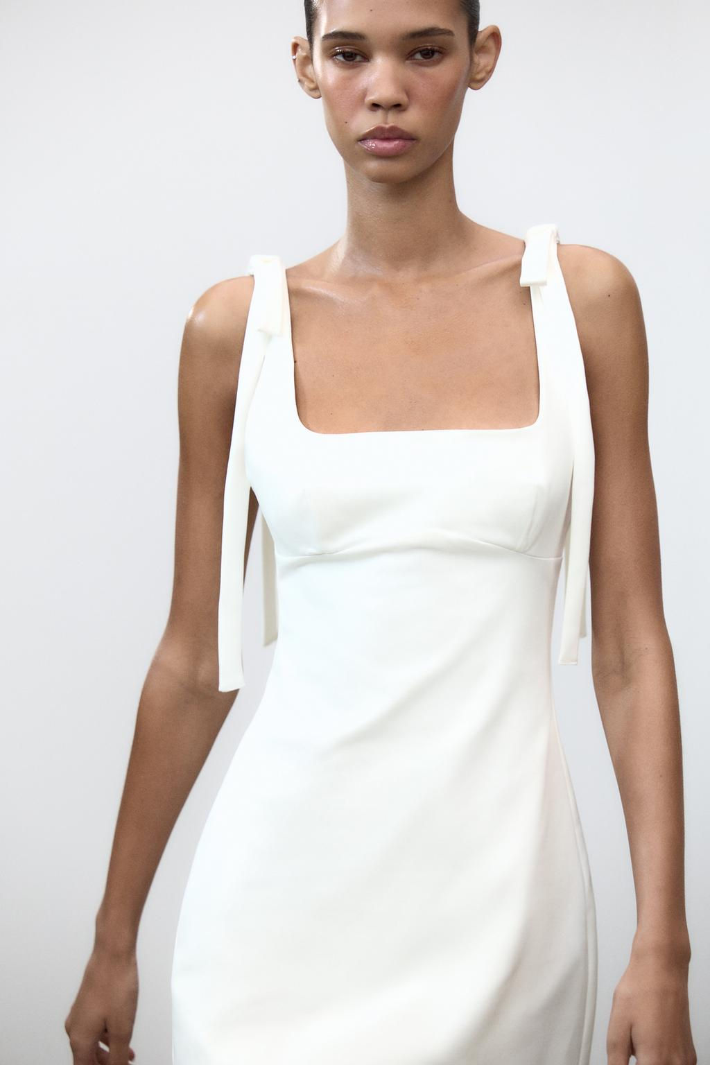 FITTED SHORT DRESS WITH BOWS
