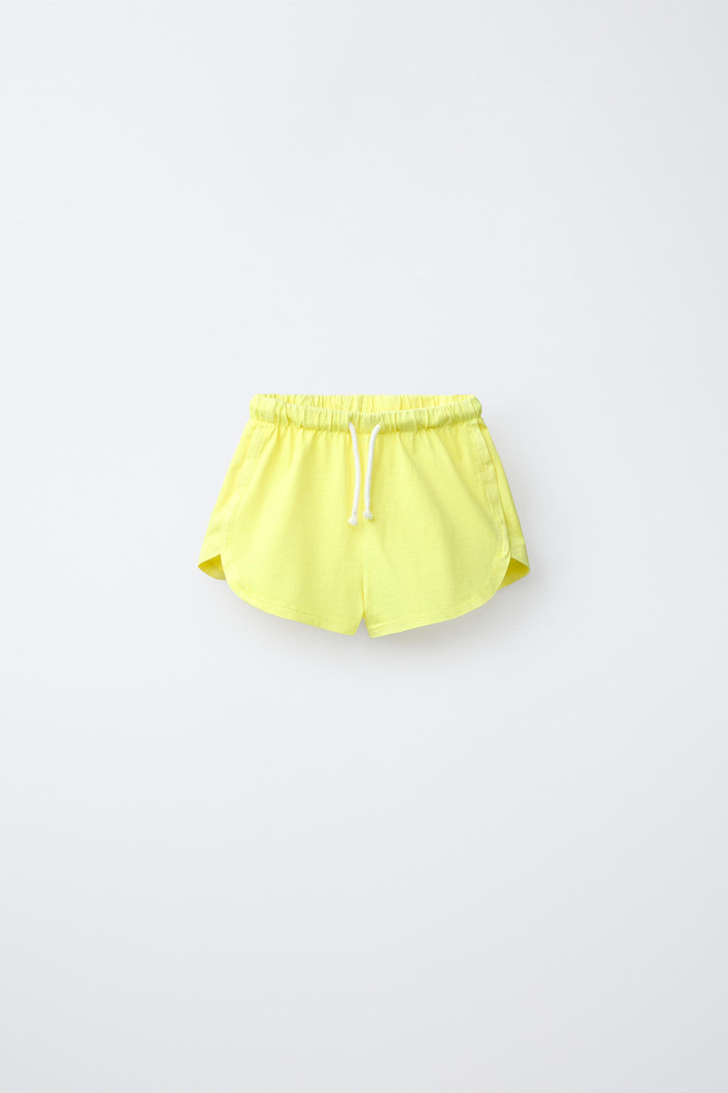 CONJUNTO JOGGING CAMISETA Y BERMUDA LISO / Amarillo