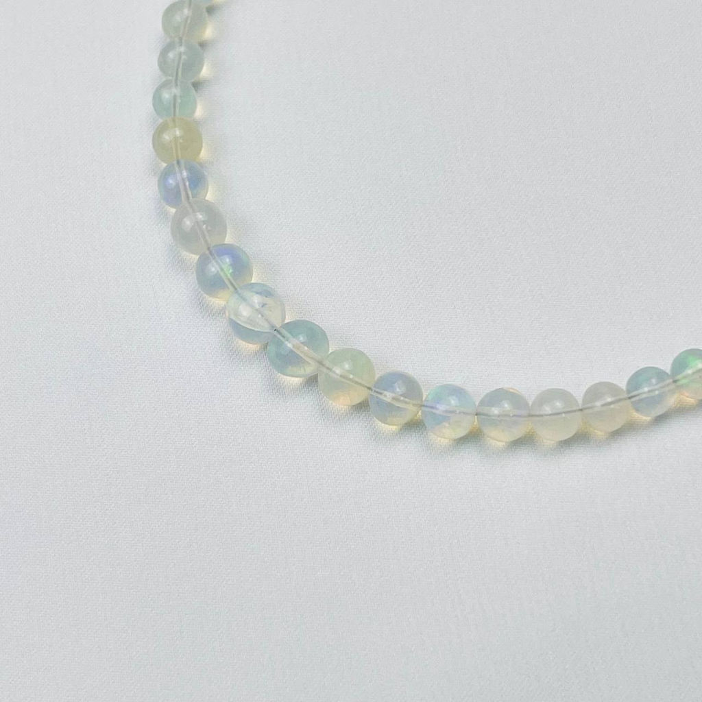 Колье на увеличение из Опала