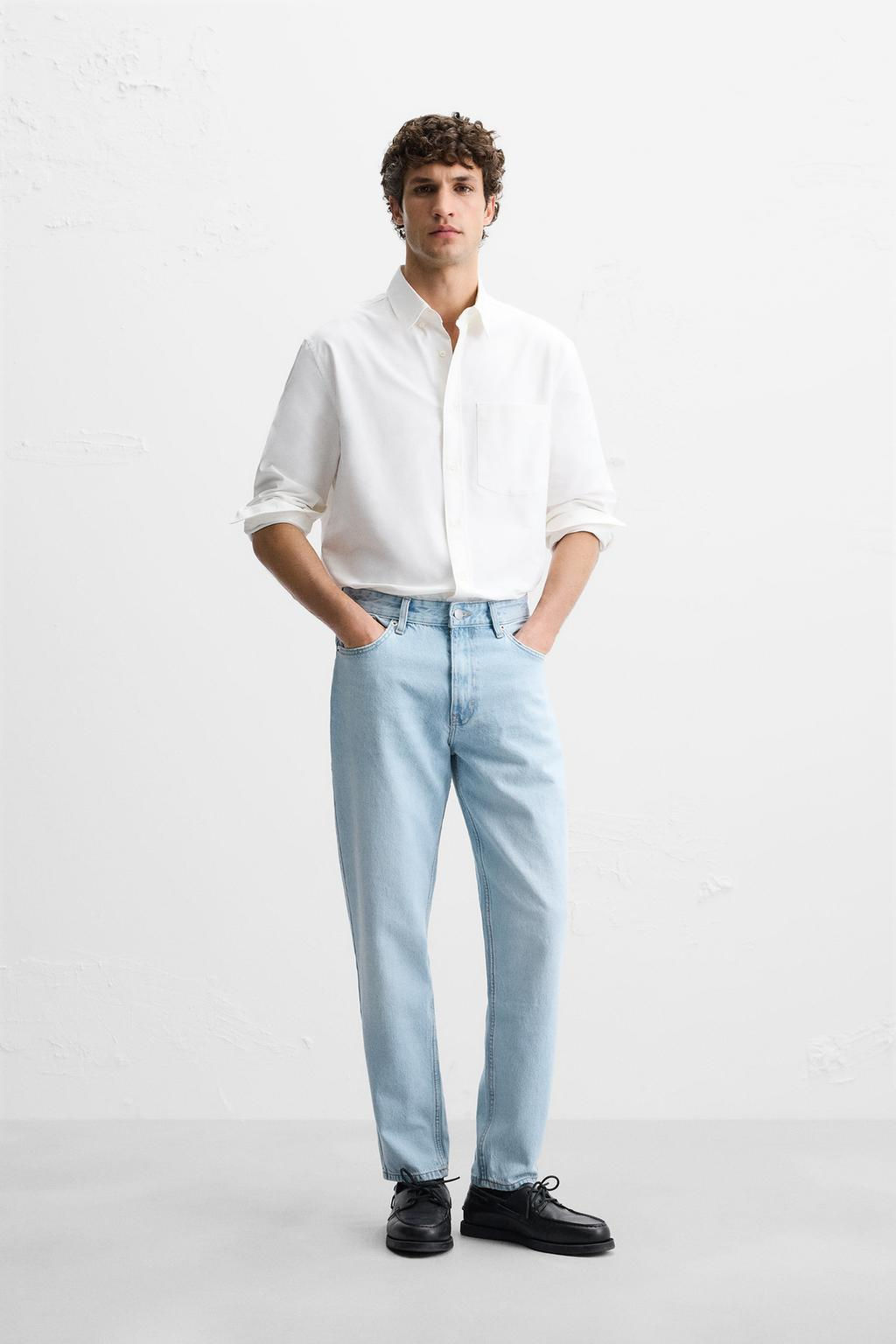 SLIM FIT TAPERED JEANS