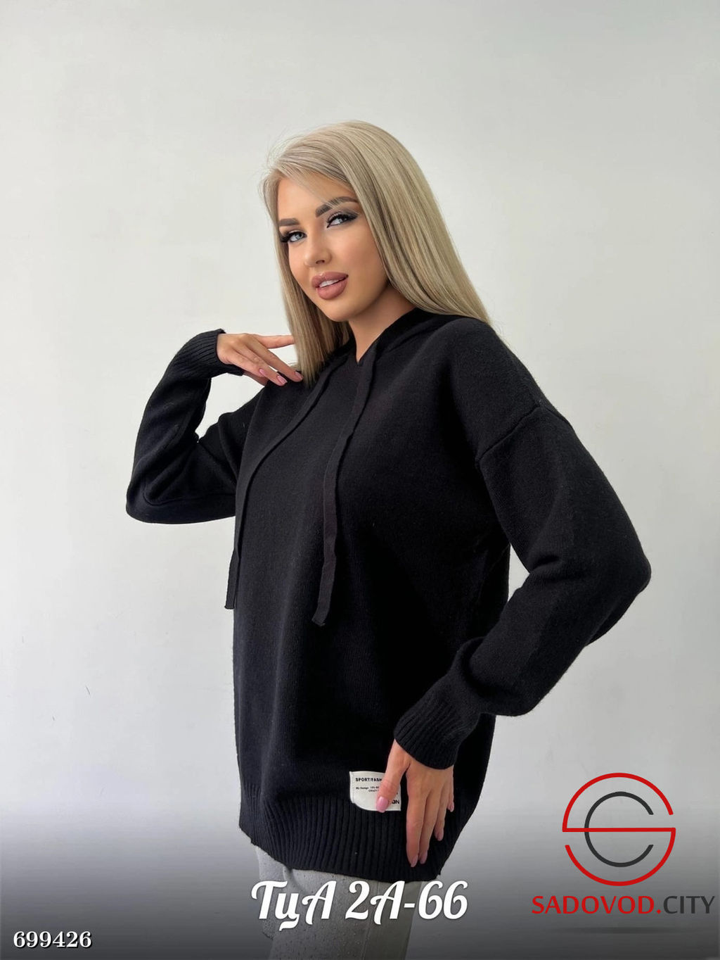 Женский удлиненный свитер