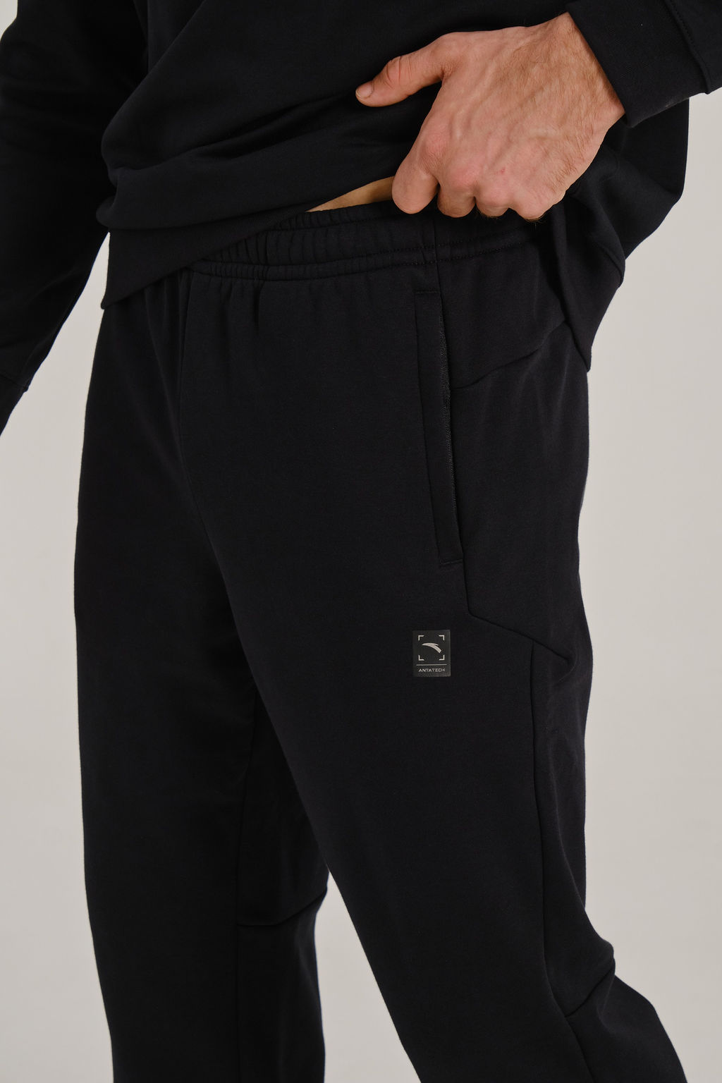 Брюки трикотажные утепленные Черный TRN Knit Track Pants - Anta фото 5