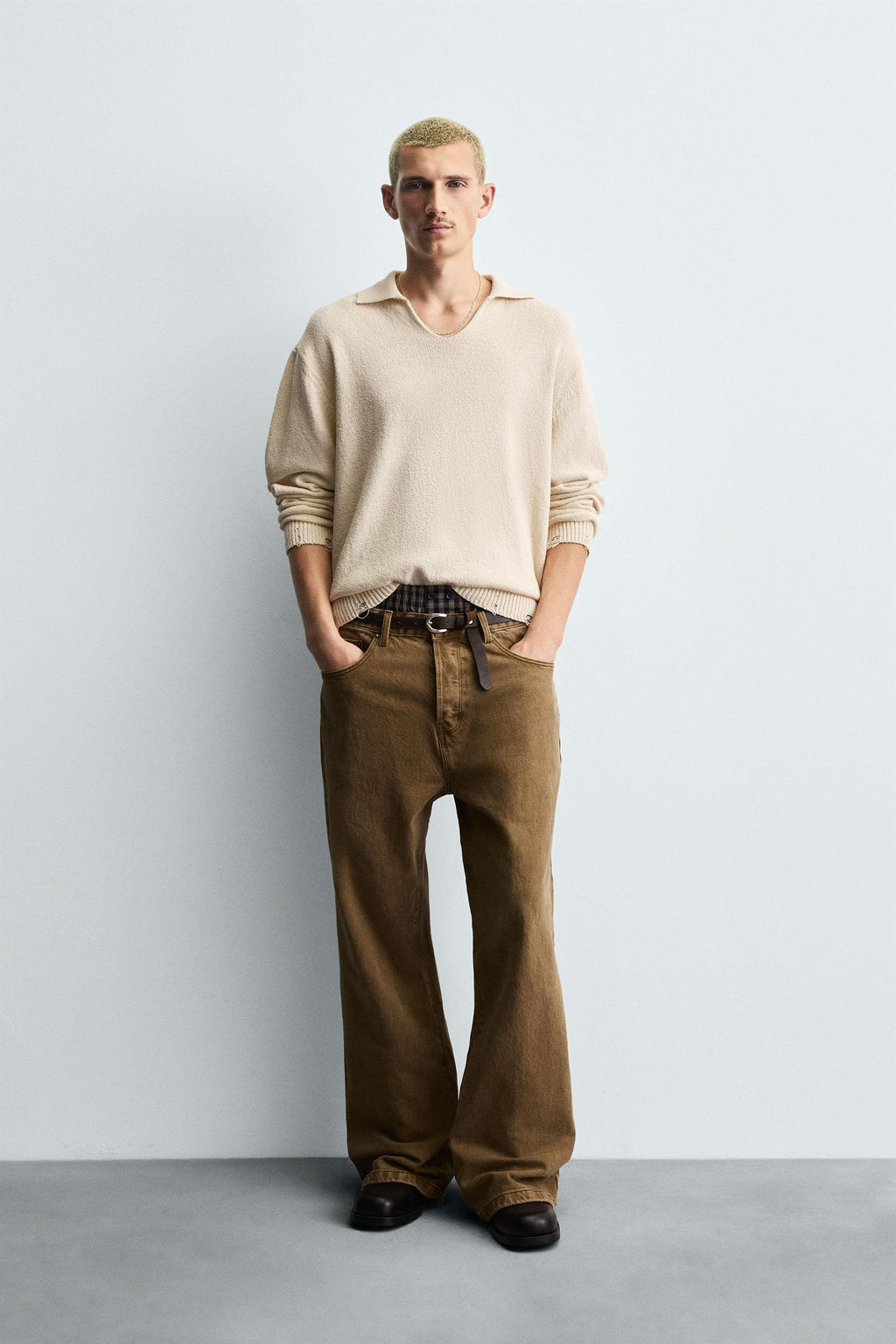 KNITTED RIPPED-EFFECT POLO SHIRT