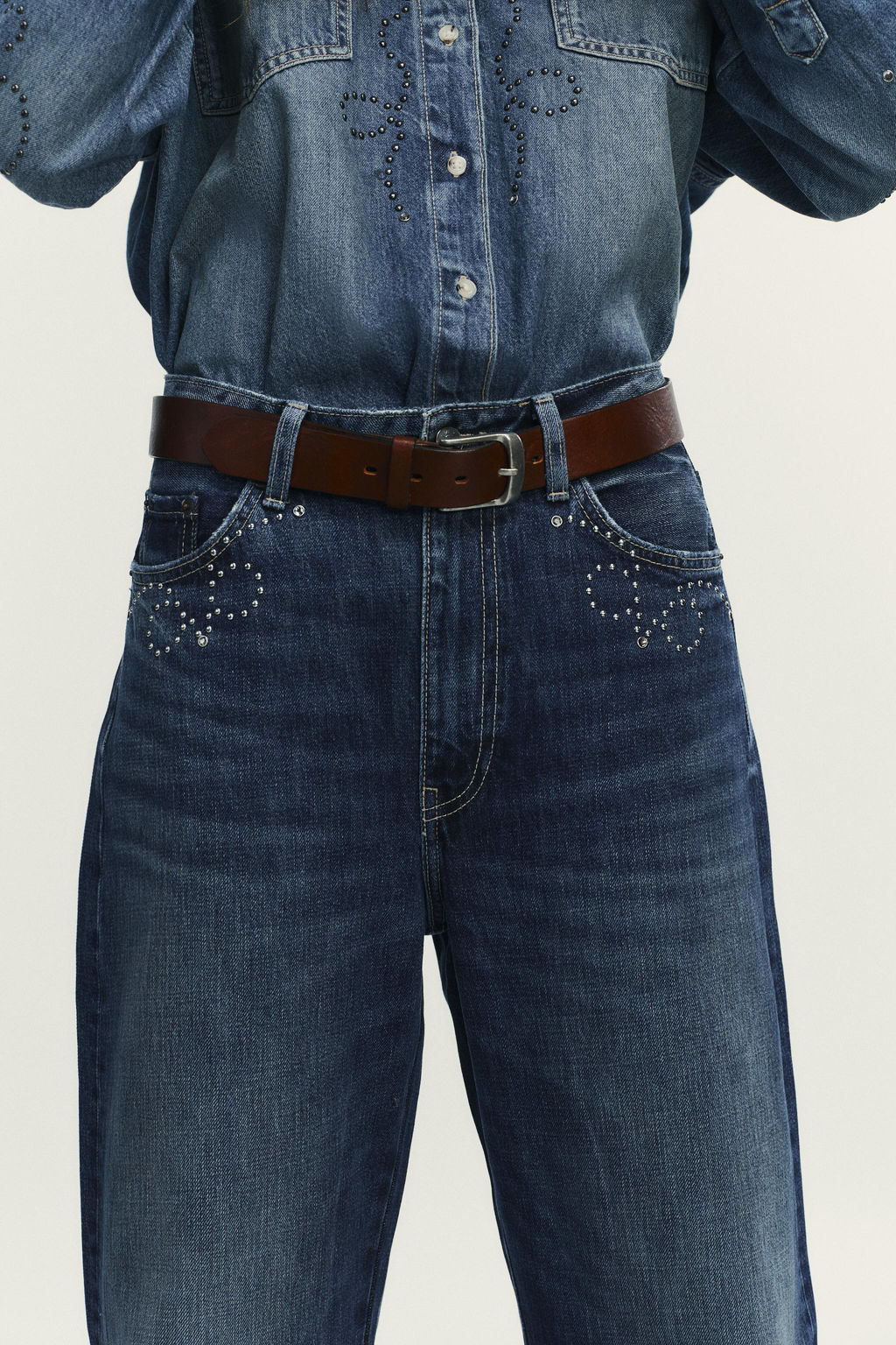 TRF JEANS WITH METAL STUDS