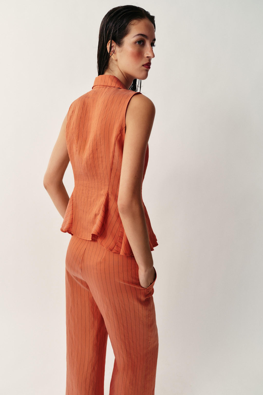 CHALECO RAYAS PEPLUM / Caldero