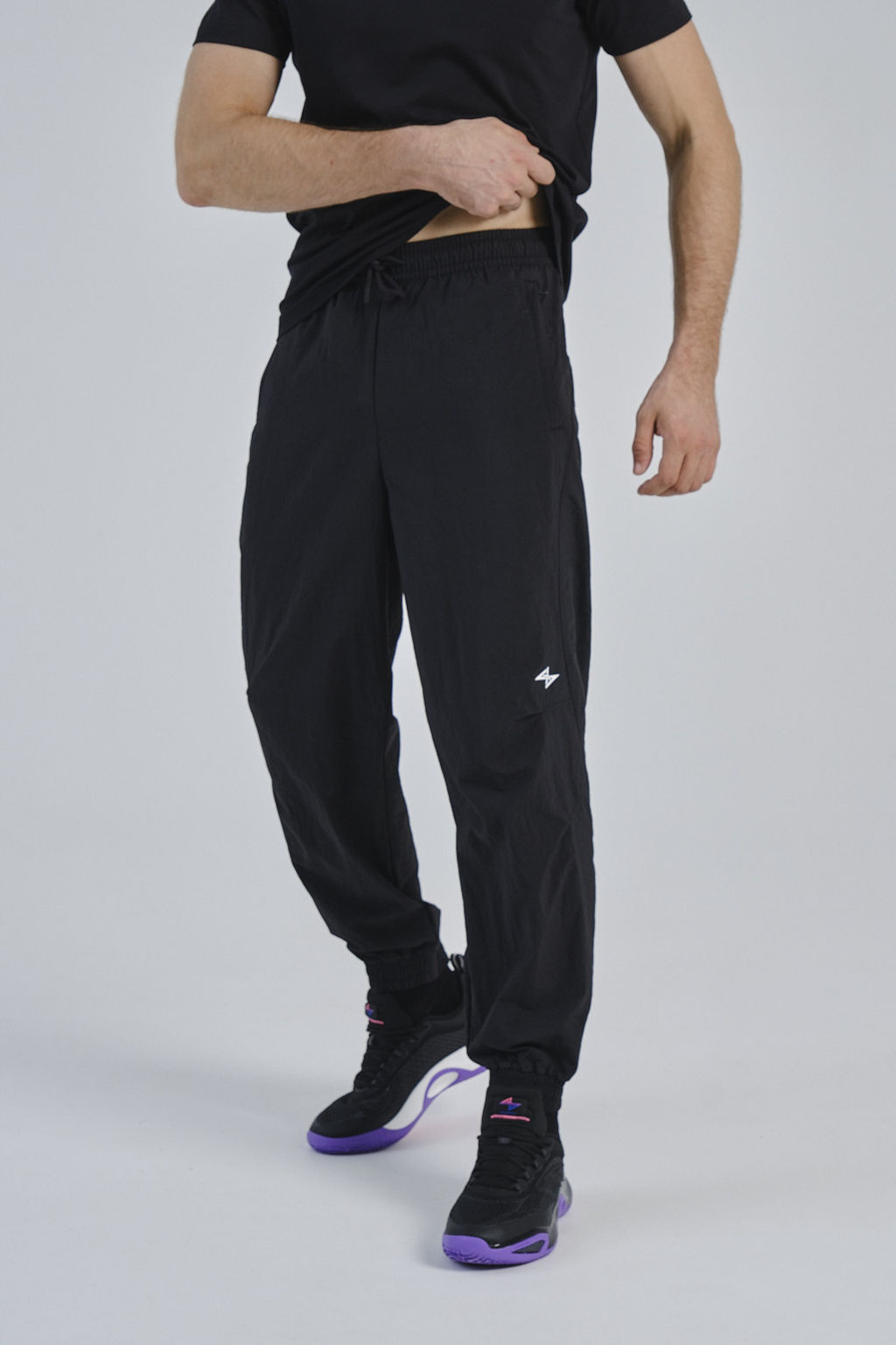 Брюки текстильные Черный SHOCK 4 Woven Casual Pants - Anta фото 4