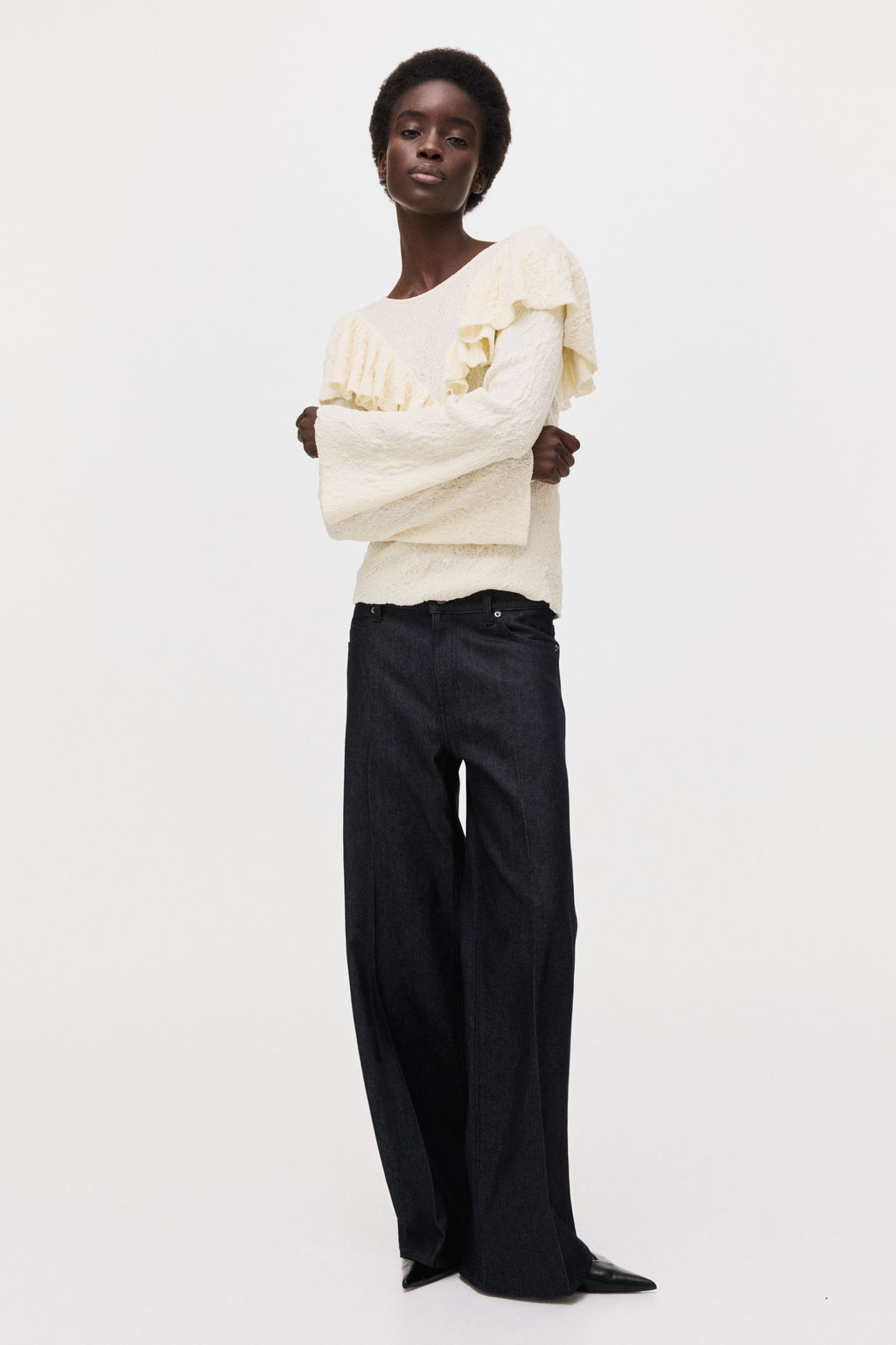 Top en punto texturizado con volantes - H&m фото 4