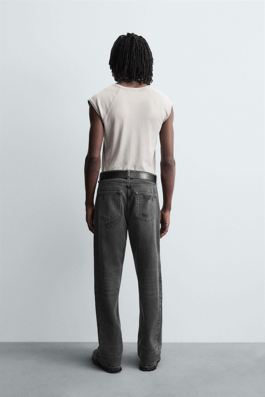 RIPPED BELL BOTTOM FIT JEANS