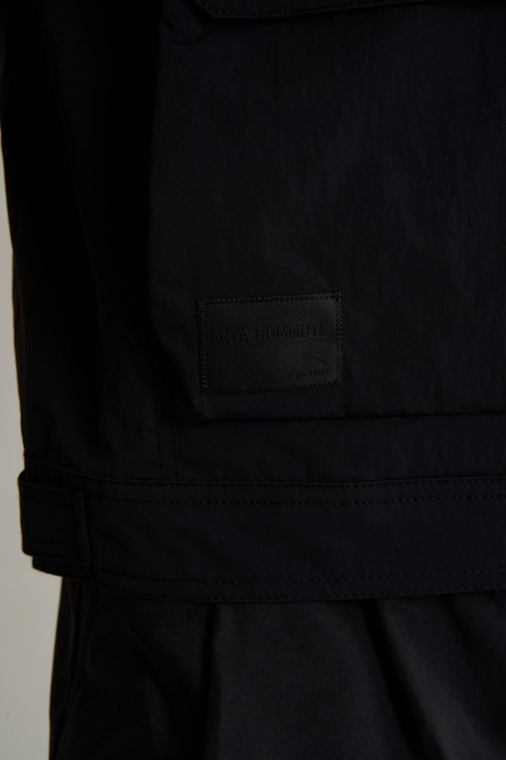 Ветровка Черный COMMUTE Woven Track Top - Anta фото 10