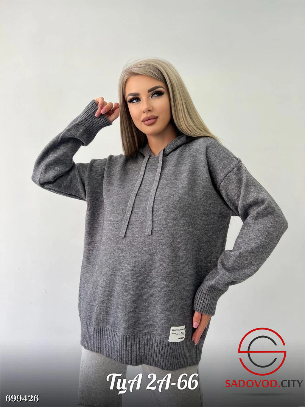 Женский удлиненный свитер