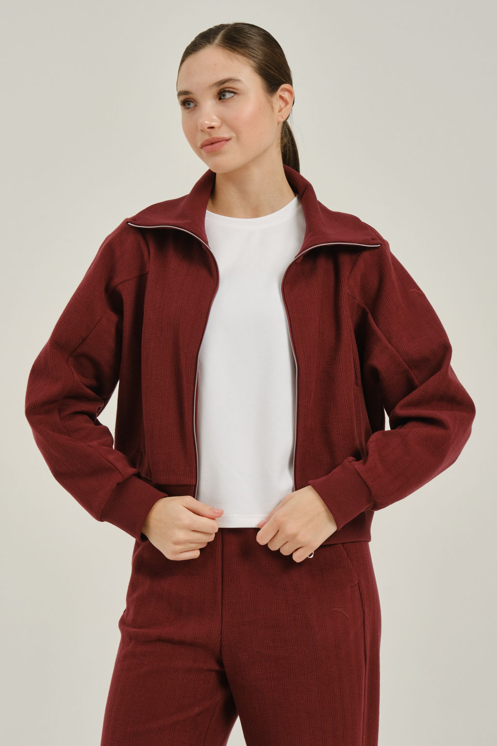 Олимпийка Бордовый COMMUTE Knit Track Top - Anta фото 7