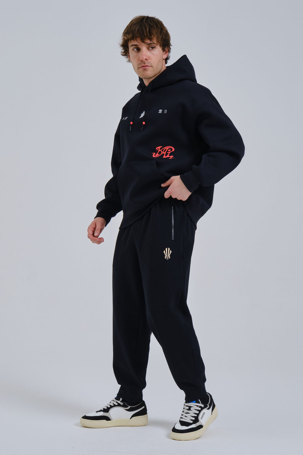 Брюки трикотажные Черный NATURAL POWER Knit Track Pants - Anta фото 7