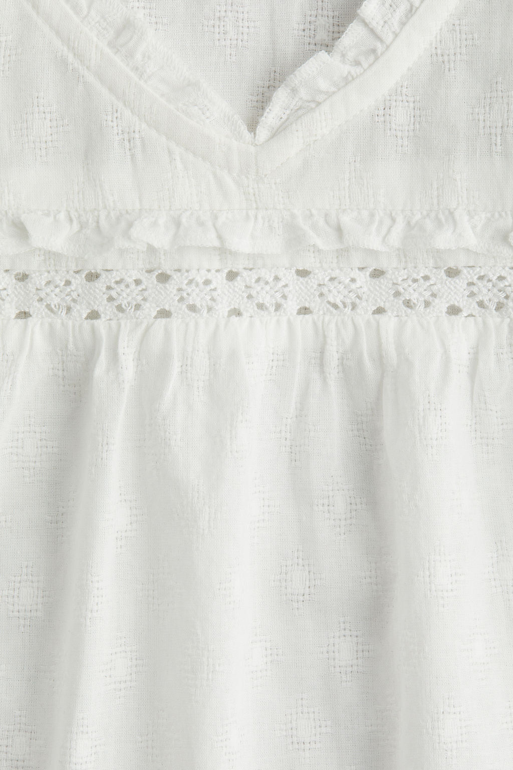 Blusa de algod?n con ribetes de volante