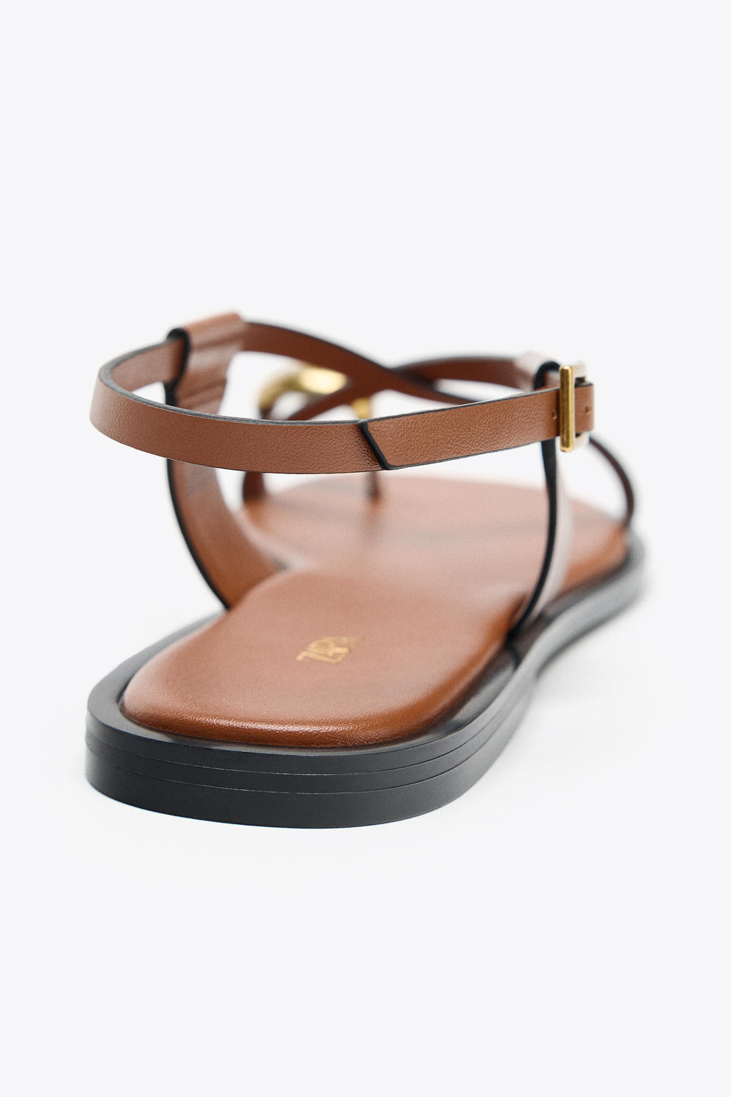 FLAT SANDALS WITH METAL TOE DETAIL