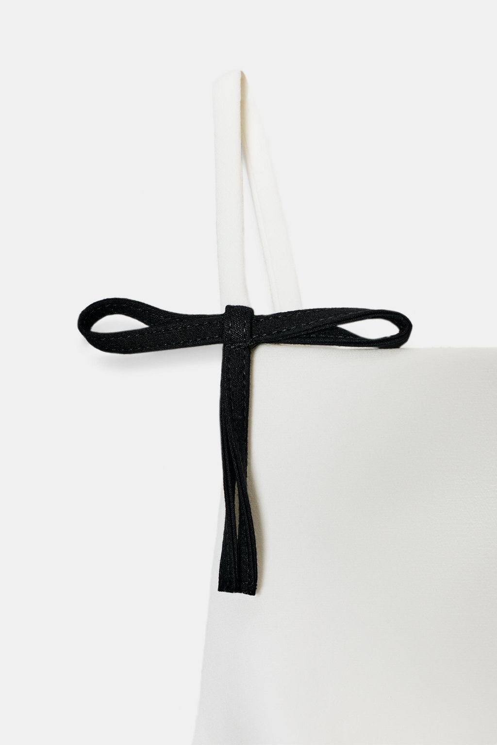 STRAPPY TOP WITH BOWS