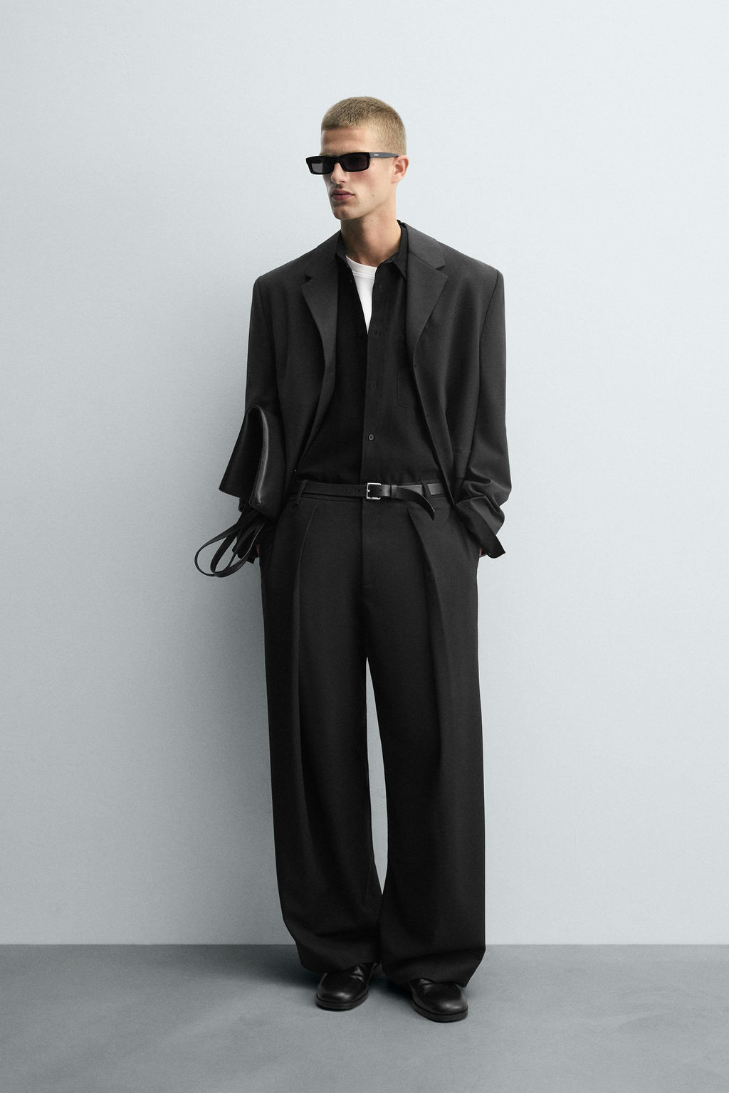 PINSTRIPED PLEATED TROUSERS