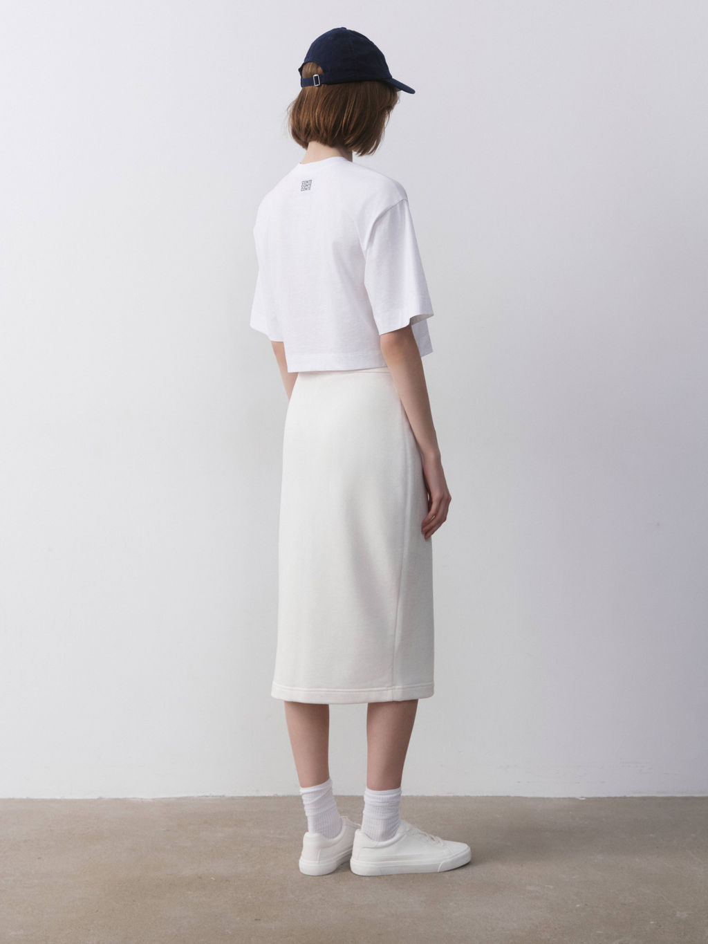 CONTE Юбка прямого кроя из футера с разрезом LU 2592 off-white - Conte elegant фото 6