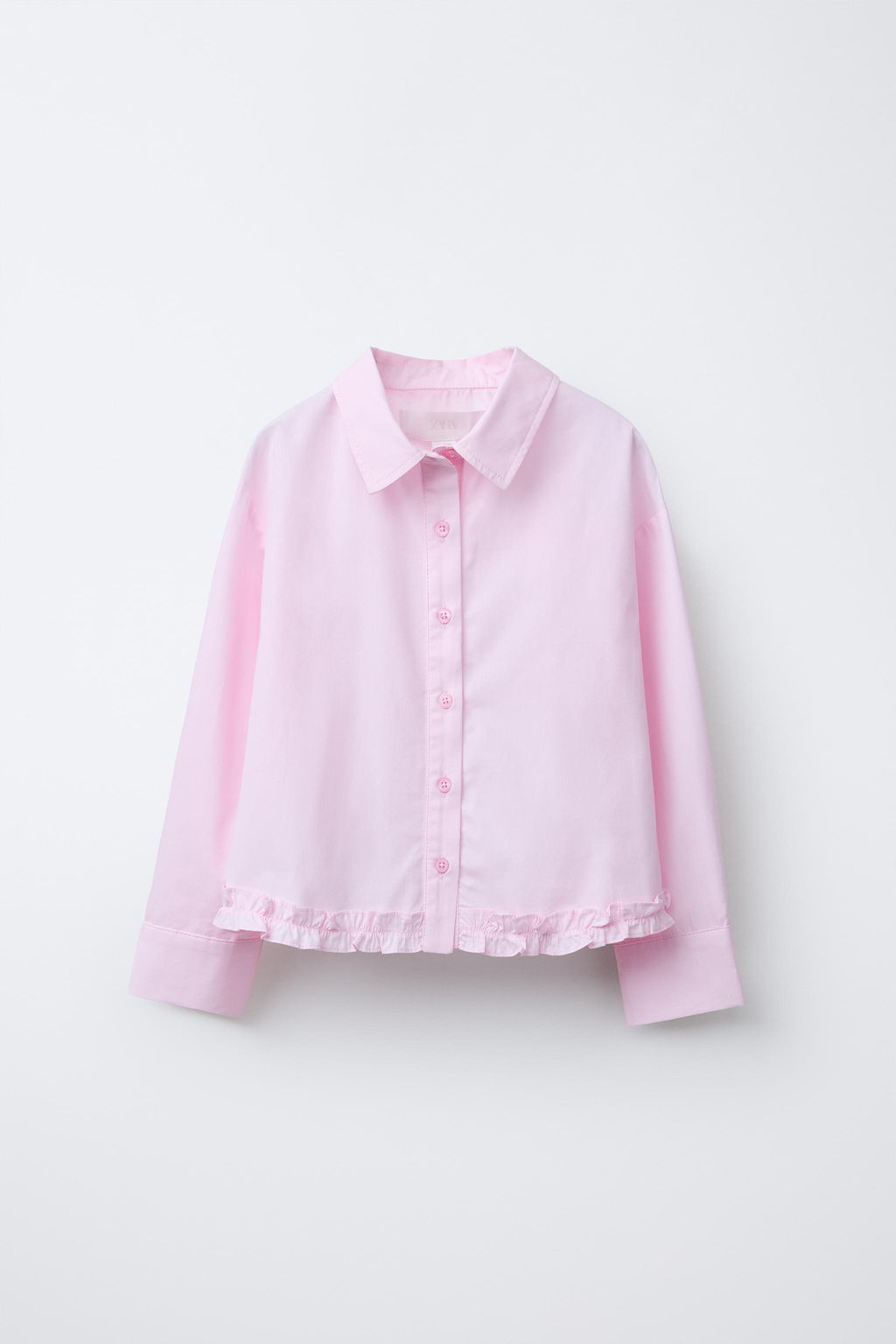 RUFFLED HEM SHIRT