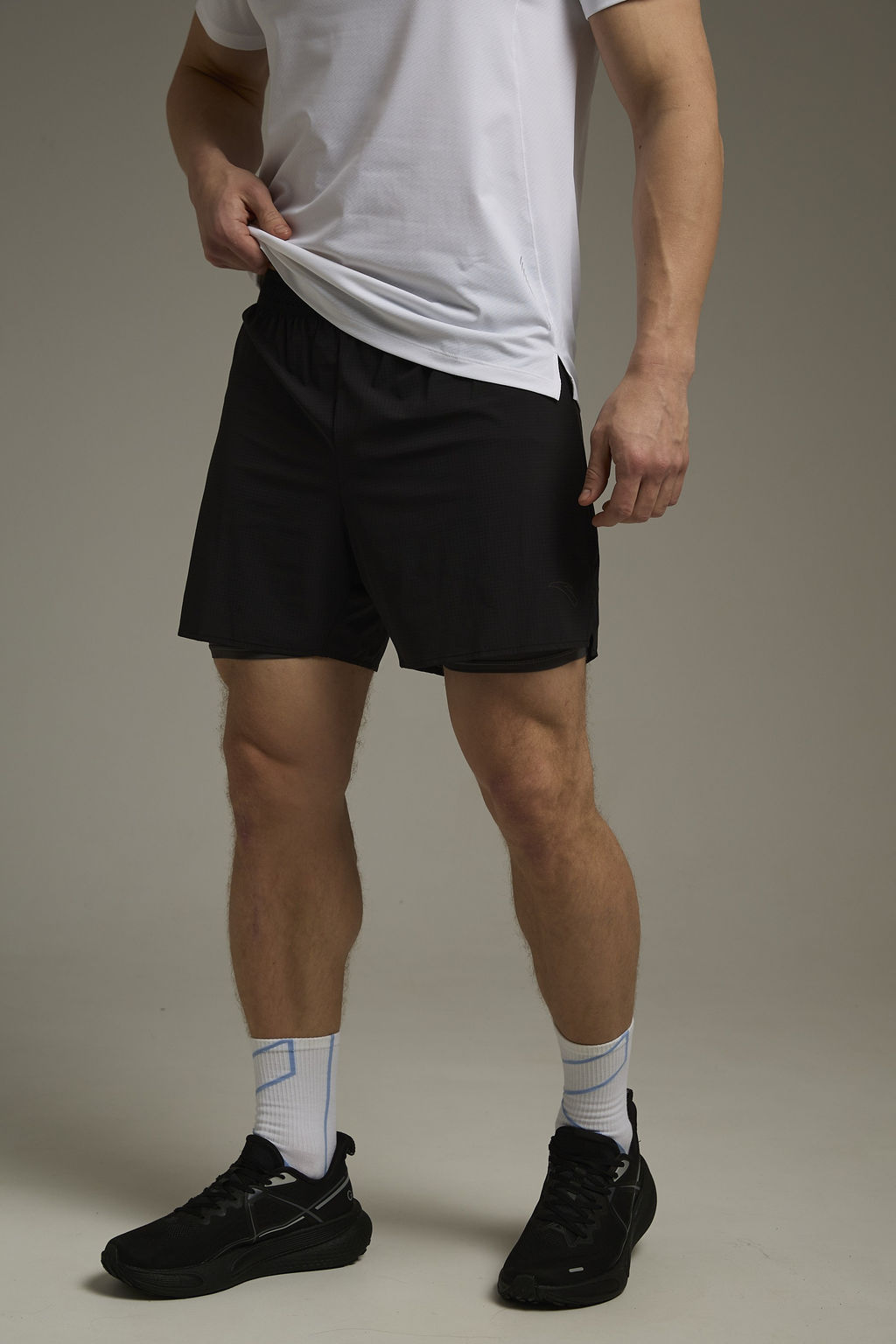 Шорты текстильные Черный RACING CHALLENGE Woven Shorts - Anta фото 3