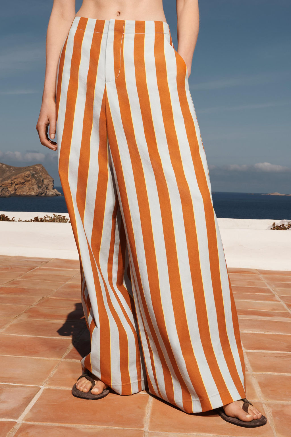 LIMITED EDITION STRIPED WIDE-LEG TROUSERS